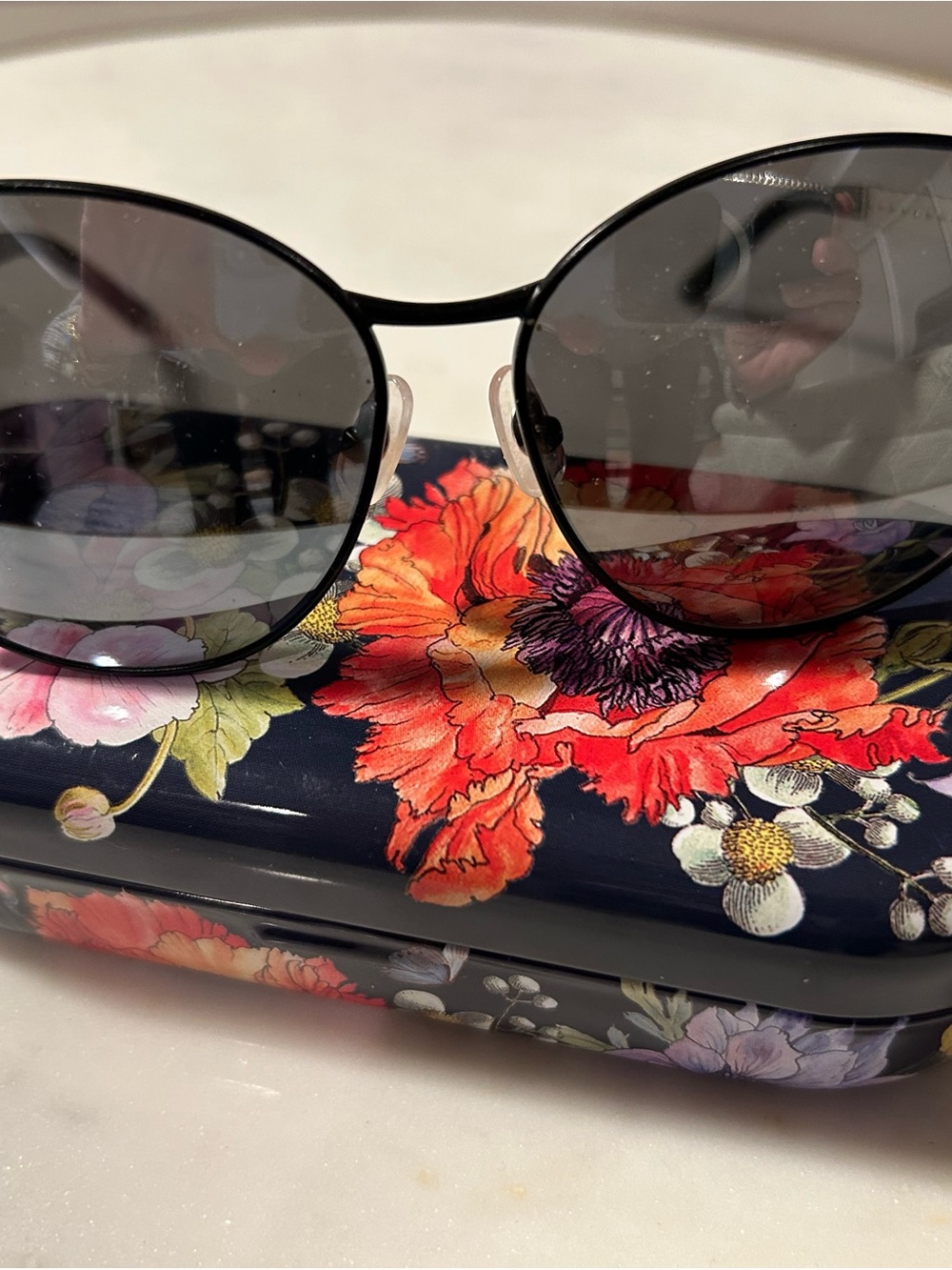 Brighton Interlok Woven Black Round Sunglasses with floral case